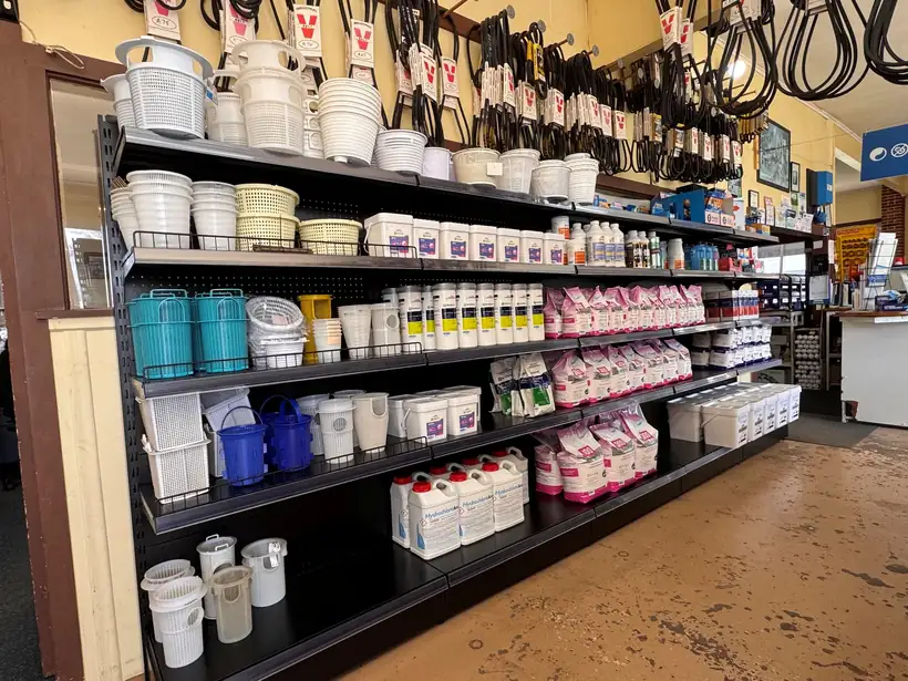 Buckets, baskets and test kits on the shop shelving