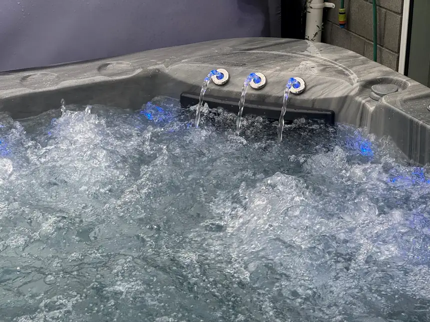 Close view of the jets running in a filled spa pool